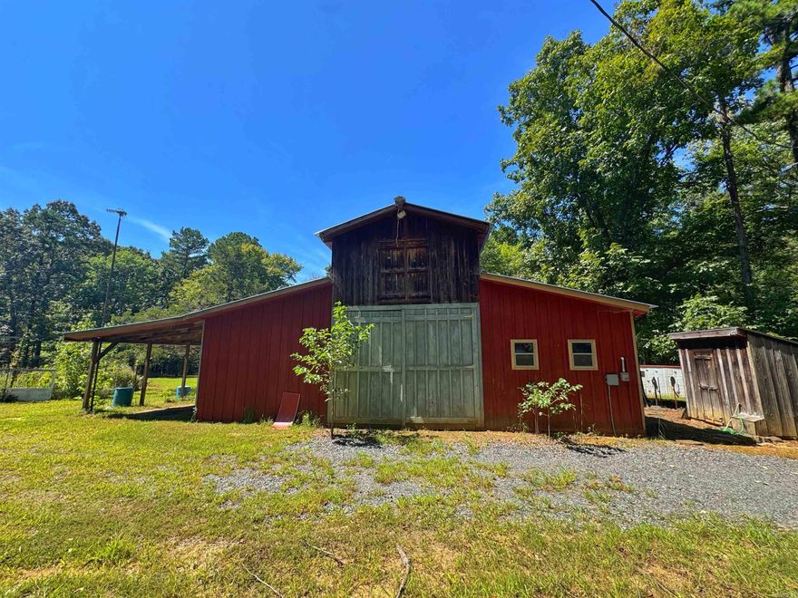 Discover a one of a kind property with limitless potential, sold as-is for those with vision and creativity. Nestled on flat, usable land with a serene pond, this rare find includes not just the home but all materials, furniture, and personal items on-site—everything conveys at closing! Featuring charming barn doors that open to let the breeze flow through both the main level and the loft bedrooms (with locking screens already in place!), this property offers a rustic yet inviting feel. Whether you dream of a weekend retreat, investment project, or unique homestead, the canvas is here it just needs your touch! No utilities will be turned on, no repairs will be made, bring your flashlights and ideas!