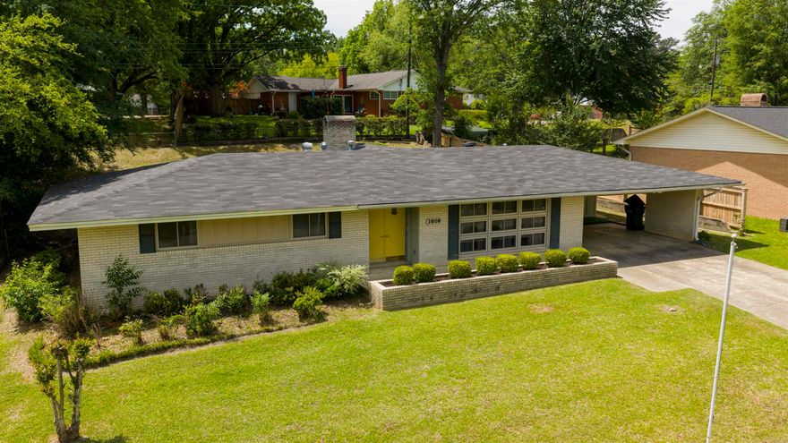 Welcome home to this spacious one-owner property offering 4 bedrooms and 2 bathrooms in a highly desirable location. This home features a kitchen with granite countertops, two separate living spaces including a formal living room and a den, plus gas logs in the fireplace for added warmth and charm. The hall bathroom has a walk-in-shower for convenience. The home has vinyl windows for added efficiency. Step outside to enjoy the beautiful backyard complete with a swing and covered outdoor area, perfect for relaxing, entertaining, or enjoying peaceful evenings at home!