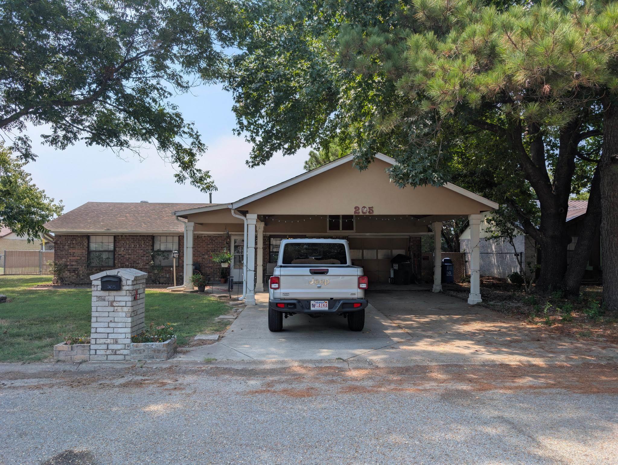 Welcome to 205 Sparkey in Bay, Arkansas. This charming and spacious home offers four bedrooms and three full bathrooms, along with a versatile bonus room that is currently being used as a fifth bedroom. The floor plan provides plenty of space for both daily living and entertaining, making it a great fit for families of all sizes. Inside, you'll find a well-maintained home with no carpet, offering a clean and low-maintenance living environment. Each room has been cared for with attention to detail, allowing you to move in and enjoy without the need for immediate updates. The property also includes two storage sheds, providing extra room for tools, equipment, or hobbies. Situated in the quiet community of Bay, this home combines small-town living with convenient access to nearby Jonesboro amenities. If you?re looking for a home that blends space, functionality, and thoughtful upkeep, 205 Sparkey is one you won't want to miss.