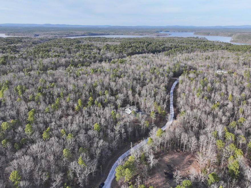 Looking for the perfect spot to build your dream home? Lot 10 at 29 Hidden Cove in the gated Denby Cove Subdivision offers 3.03+/- acres in Mount Ida. With city water and underground electric already in place, this property is ready for your new home! Enjoy the convenience of paved roads and the natural beauty of the area, just 1 mile from Lake Ouachita and a short drive to local amenities in Mount Ida and Hot Springs.