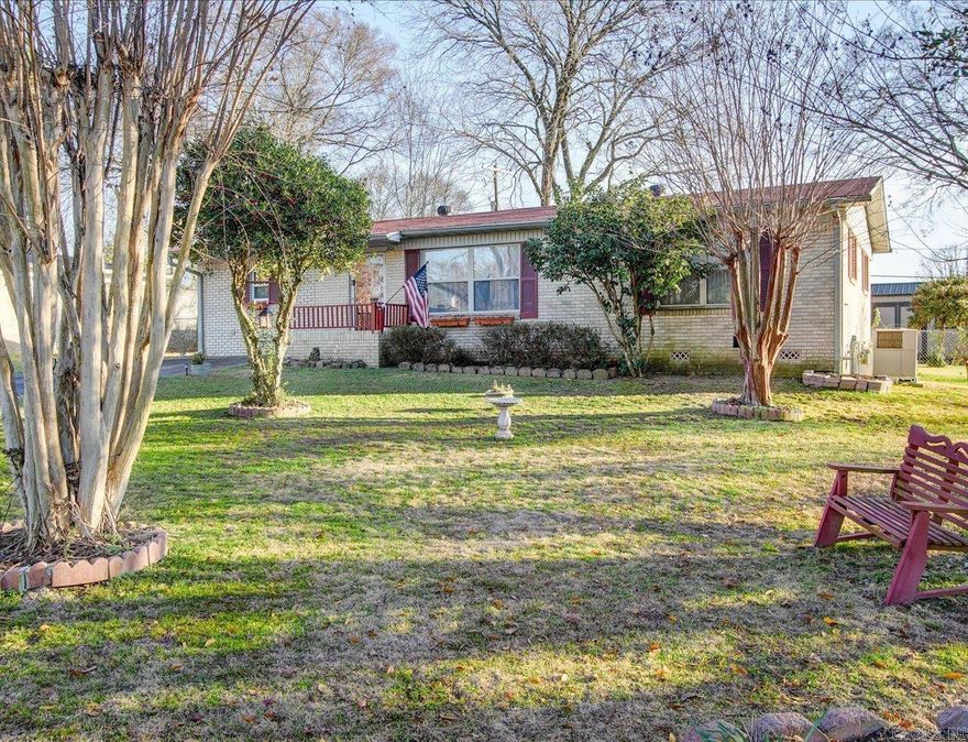 Adorable Inside and Out! This one has it all! Come see this move-in ready city home conveniently located to shopping, dining, lake and medical facilities! Original (restored) hardwood floors & luxury vinyl on all flooring surfaces, open kitchen with breakfast area, carport conversion gives you a 3rd bedroom with half-bath. Beautiful fenced backyard with deck area, grilling area & built-in brick over and 2 out-buildings for tons of extra storage. This one is a gem and ready for you to move right in!