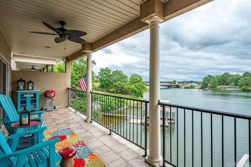 Welcome to the Lake!!  This bright and open condo is waiting for your weekend fun. Condo is on the top floor with an exterior elevator right at your front door, so take advantage of the lake views without the worry of stairs.  Assigned parking spot is also right by the elevator.  You will enjoy the open floor plan and views of the lake.  The primary suite is spacious with a large walk-in closet and the bath offers both a walk-in shower and a large tub.  Located in a prime location both by road and on the lake, this condo is perfect for dinner, shopping and boating.  The complex allows nightly rentals as well, so could be a great income producing property.   New HVAC in 2017, microwave in 2024, extensive renovation of the patio in 2022.