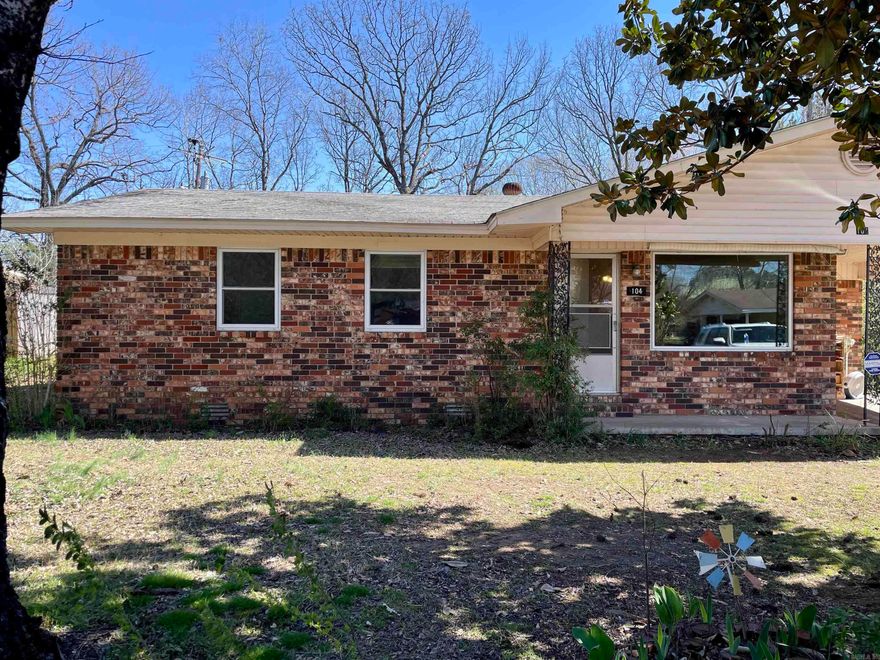 Sturdy older brick home with a full set of replacement windows and a private back yard with outbuildings.  Needs updates but is livable now. See important Agent Remarks. Fridge conveys.