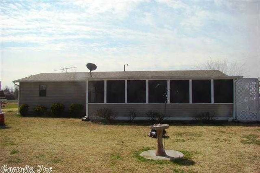 This home is a must see at this price.Great 3 bedroom 2 bath home sitting on over 6 acres m/l .Large spacious kitchen .Master bedroom has it's own bath,large screened in sunporch. Circle drive .Call for you tour today.   combination lock box see agents remarks