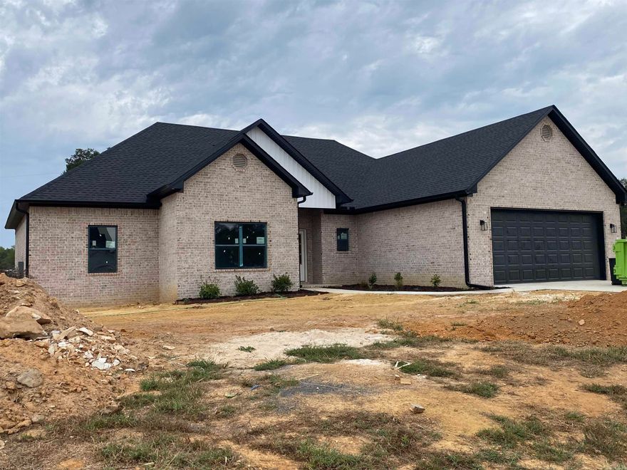 2023 New Construction Home Underway.  This 4-Bed, 2-Bath home has light and dark tones applied.  Entering the home one will be greeted by the Foyer leading to the Living Room w/an Ultra Open Concept.  Kitchen Island and Counters are granite.  This spacious ultra open concept allows for an ideal entertainment home w/Dining off the Kitchen facing the front yard.  The home boasts a Split Floorplan with Master on the right and Guests on the left.  Mud room and Storage area by garage w/large laundry room.  Home is projected to complete within 30-days!  See Assoc Docs for floorplan.  See Agent Remarks.