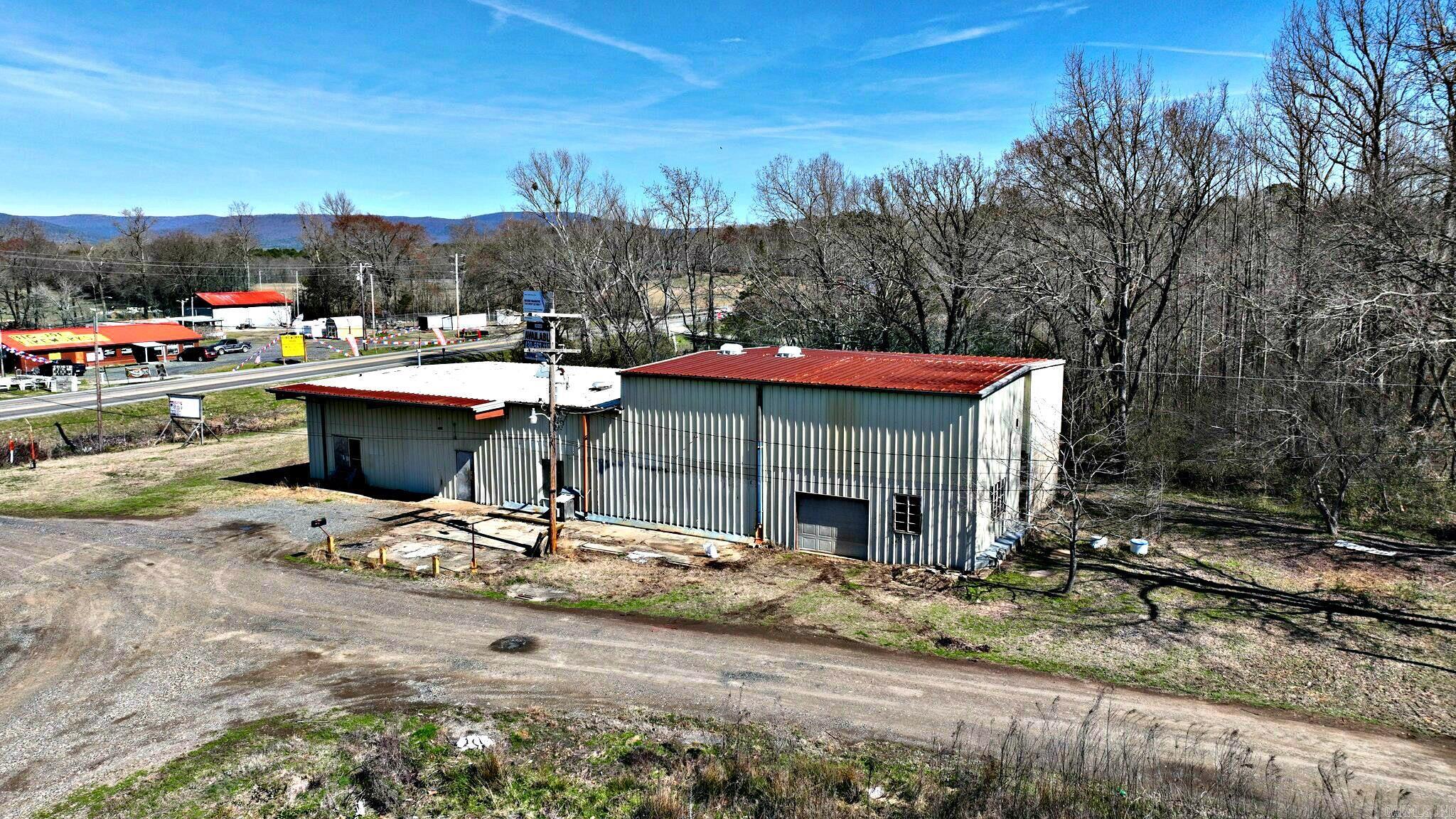 Versatile 4,160 Sq. Ft. Building on 1 Acre. Looking for a spacious property with endless potential? This 4,160 sq. ft. building, set on 1 acre, offers the perfect opportunity for a retail shop, storage facility, or even a unique living space. Built in 1985, this property provides a solid foundation for your vision. Additional income potential with an on-site billboard rental generating approximately $750 per year! Whether you're an entrepreneur, investor, or looking for a large multi-purpose space, this property has the flexibility to suit your needs.