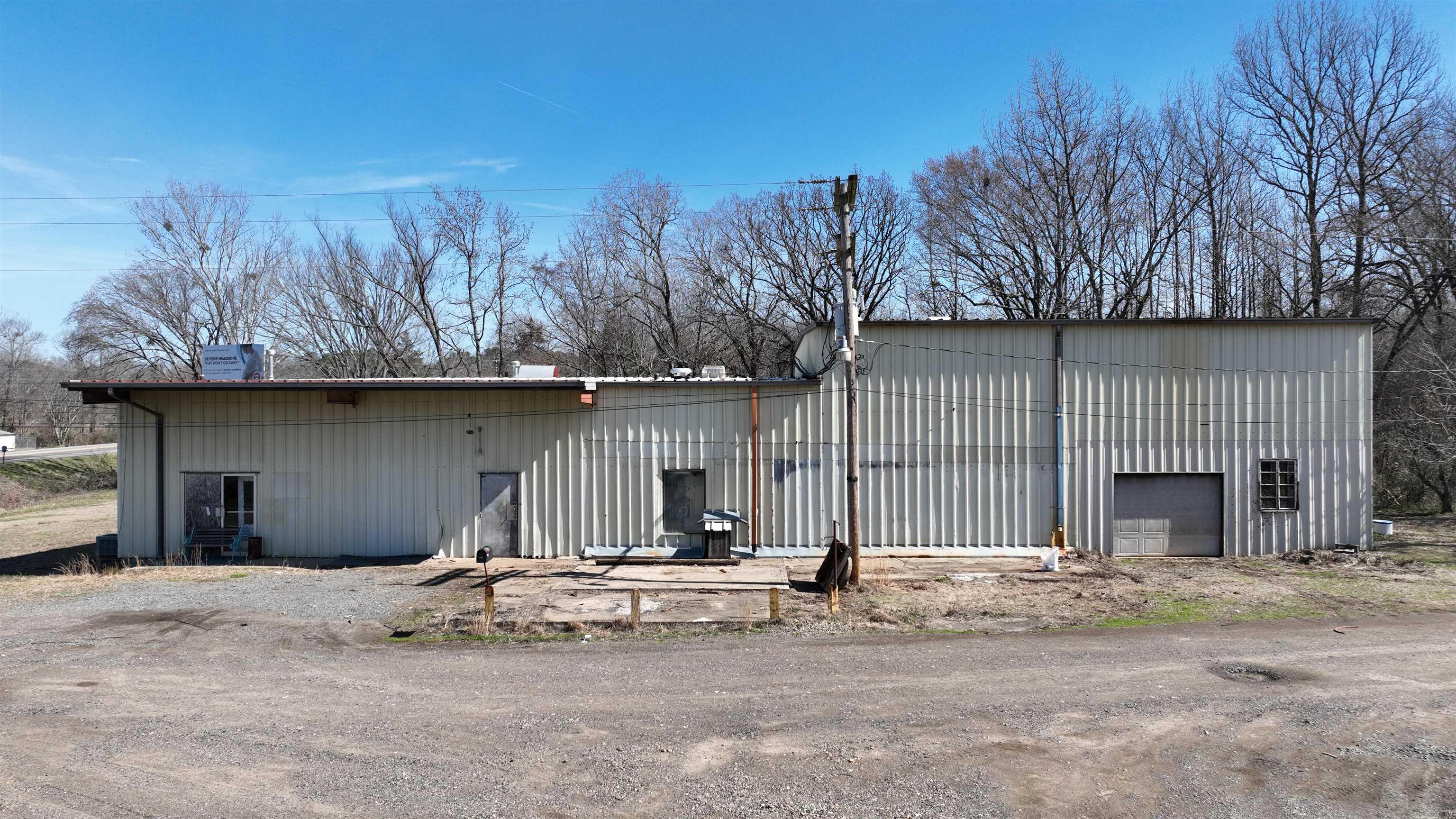 Versatile 4,160 Sq. Ft. Building on 1 Acre. Looking for a spacious property with endless potential? This 4,160 sq. ft. building, set on 1 acre, offers the perfect opportunity for a retail shop, storage facility, or even a unique living space. Built in 1985, this property provides a solid foundation for your vision. Additional income potential with an on-site billboard rental generating approximately $750 per year! Whether you're an entrepreneur, investor, or looking for a large multi-purpose space, this property has the flexibility to suit your needs.