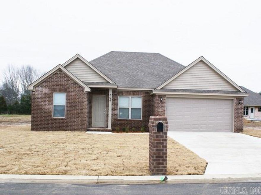 Newer home in one of Searcy’s newest subdivisions (Ridgewood). This brick 3BR/ 2BA 1412 sq ft, offers a split floor plan, carpet, laminate and tile flooring, 2 car garage with keyless entry, big family room, and great landscaping. Large eat in kitchen with crown molding. Master Bedroom has crown molding and tray ceiling, large master bathroom with double sinks, and has a large walk in closet. Easy no-steps entry from garage into house. Yard is sod and landscaped.