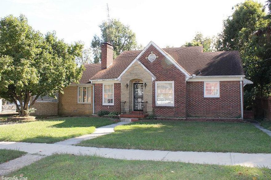 Charming older home ... quite immaculate in it's day!  This 3 bedroom / 2 bath home sits on one of Paragould's historic streets and features (2) living areas ... one with wood burning fireplace and one that could be a den or game room plus a partial unfinished basement with a 3rd "roughed in" bath.  This home has impressive square footage but needs work/updating plus a large lot.  Seller Property Disclosure is not available and house is to be sold "AS IS"!  Call today to schedule your tour!