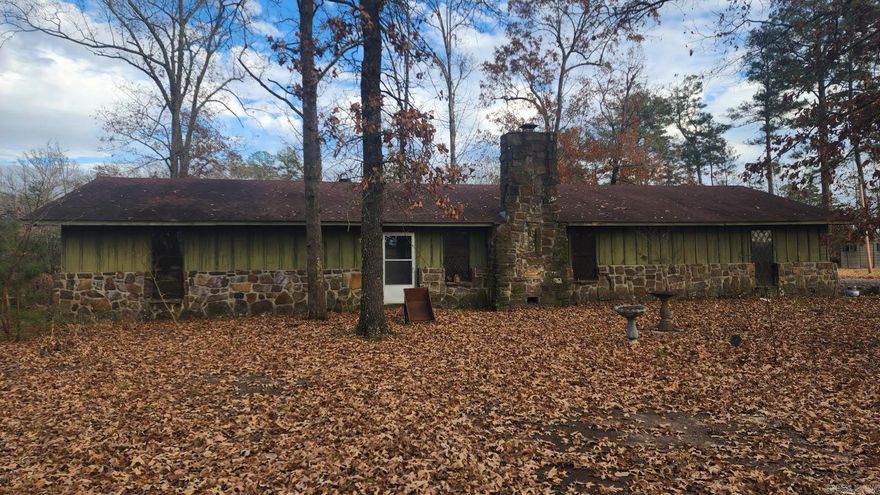 Built in 1979 this stone & cedar one owner  home on almost 10 acres with LARGE 2bedrooms  & 2.5 baths.  Large sun room at back of house has plenty of room for pool table, family gatherings  or just relaxing. At one time, there was a thriving Blueberry and Strawberry  field near the pond.  House does need some remodeling but the pond & fields can be restored and it be a beautiful home to enjoy for years to come .  You could also sell off a lot or two  for a little extra income if desired.   Please call Realtor for appointment
