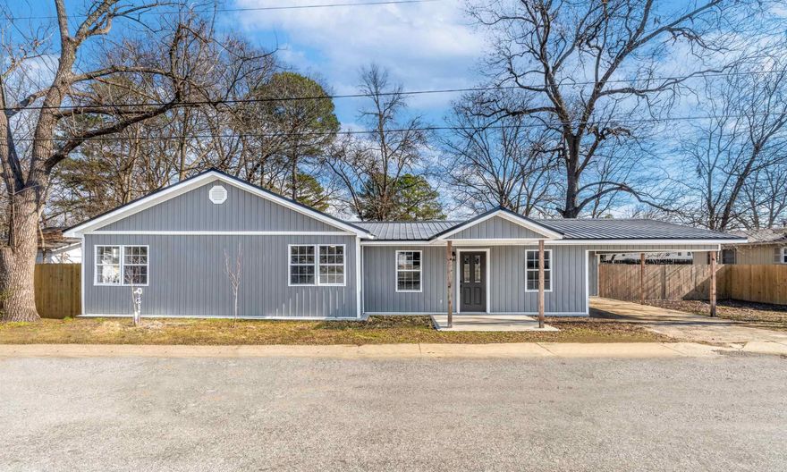 Step into this one-of-a-kind stunningly renovated home nestled in the heart of this quaint town. This home greets you with a gigantic living space as you walk in, and it only gets more enticing from that point forward! This open concept home is adorned with freshly installed light fixtures throughout every space, adding a touch of contemporary flair to every corner. The bathrooms have been totally transformed and both have farmhouse sink vanities. All closets offer generous space, ensuring ample room for storage and organization, and let's not forget the abundance of natural light streaming in through the newly installed windows, illuminating every room with warmth.  Embrace the abundance of space, both indoors and out, including a large fenced-in backyard offering privacy and endless possibilities for outdoor enjoyment.  Imagine playing a little game of kickball in the backyard with your family!  IT IS A DREAM HOME! Schedule your tour today!!!!  -Brand New 2023 HVAC with warranty -Brand New 2023 Metal Roof -Beautiful Backsplash -Brand New 2023 Hot Water Heater -All Brand-New Kitchen Appliances -Brand New Beams in LR -Brand New Siding -New Plumbing & SO much more!