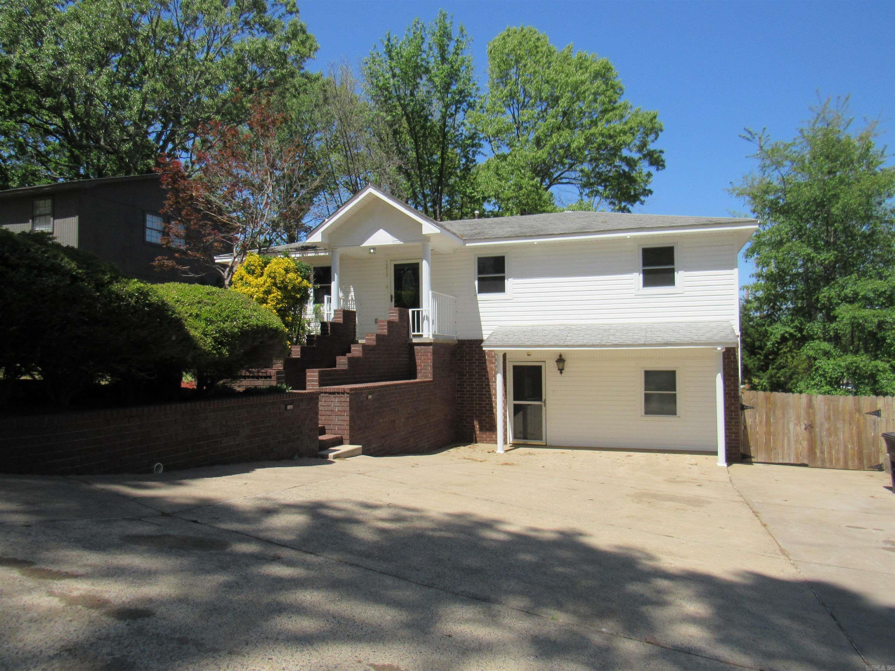 Beautifully Renovated & Move-In Ready! Step into this spacious and stylishly updated 4-bedroom, 2.5-bath home that offers room for everyone and everything. With two generous living areas, a cozy breakfast nook, dedicated laundry room, and tons of storage, this home combines comfort and convenience at an unbeatable price. The modern kitchen is a standout, featuring sleek granite countertops and brand-new stainless steel appliances. Enjoy the fresh new look throughout with waterproof laminate flooring in the main areas and plush new carpet in the bedrooms. Outside, you'll find ample parking, a large backyard perfect for play or gardening, and a massive deck ideal for entertaining or relaxing in the sunshine. Downstairs, unwind in the expansive den complete with a stylish accent wallāperfect for movie nights, a game room, or a cozy retreat. Donāt miss the opportunity to make this beautifully updated home yours!
