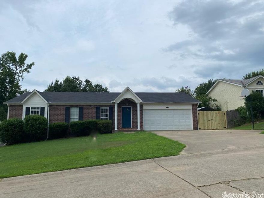 Remodeled home in Alexander with new flooring and paint, new kitchen countertops, 2 car garage and fenced in back yard.  This home features a new refrigerator, washer and dryer for the tenants use.