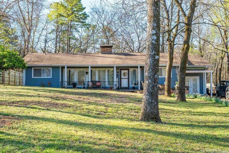 This adorable home is ready for a new owner! There are so many features, it is hard to mention them all. Enjoy the front porch sitting area, just across the street from the golf course. 3 bedrooms, 2 full bathrooms, private office, and spacious laundry room. The sunroom features a hot tub and office to overlook the back yard, surrounded by nature for extra privacy. The primary suite has a heated jetted tub, double vanity, and walk-in shower. Don't forget the mancave just off the front porch. All mounted TVs convey. On top of everything in this home, you have the amenities of Diamondhead just minutes from downtown Hot Springs & Oaklawn racetrack. Diamondhead offers a PGA sanctioned golf course, Olympic size swimming pool, children's playground, tennis, basketball & pickleball courts, clubhouse, community library, exercise room & lots of friendly neighbors.