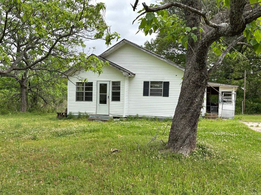 Beautiful 2 acres of land but house needs lots of TLC.