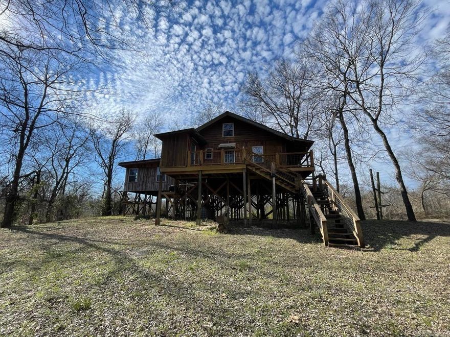 Welcome to Arkansas paradise! Nestled on almost 2 acres along the Caddo River in Arkadelphia, this charming home offers peaceful country living with breathtaking river views right outside your door. The home also features a brand-new HVAC system. Step outside to enjoy the updated deck, the perfect spot for morning coffee or evening sunsets. Whether you’re looking for a full-time residence, a weekend getaway, or an investment opportunity, this property offers it all. If you’ve been dreaming of quiet riverfront living this Caddo River home is a must-see.