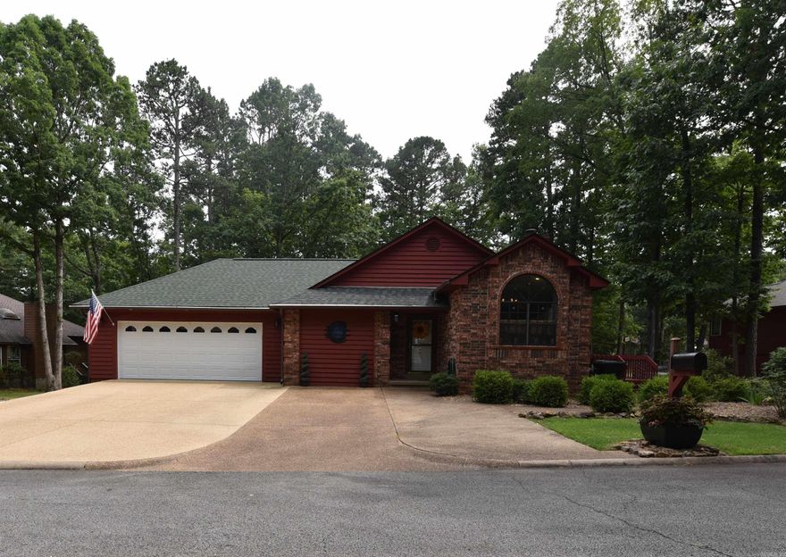 Welcome to this beautiful, 3-bedroom,1.5 bath home featuring numerous upgrades and attention to detail.  The kitchen is finished with granite countertops, quality cabinets, fixtures and more. The living space features a lovely fireplace, attractive LVP flooring, current trend color scheme, volume ceilings, and a light and bright ambience.  This wonderfully appointed home, located in a highly desired area of Fairfield Bay, Arkansas, situated on an oversized lot, directly on the 13th hole of Indian Hills Golf Course, will not disappoint.  It is a golfer's dream location, featuring an oversized two car garage and dedicated, golf course facing overhead cart door.  Drive from your garage onto the course and enjoy your day.  Upgrades include new roof, HVAC 2023, generator 2022, new paint, oversized deck, side deck, hot tub and more.  Located close to all the amazing amenities offered in the community such as the full-service marina on pristine Greers Ferry Lake, ATV trails, three community pools, 2 golf courses and only a short drive to the Little Rock airport, what are you waiting for?  Make this Ozark gem your next reality. Furnishings, Polaris ATV, golf cart are negotiable.