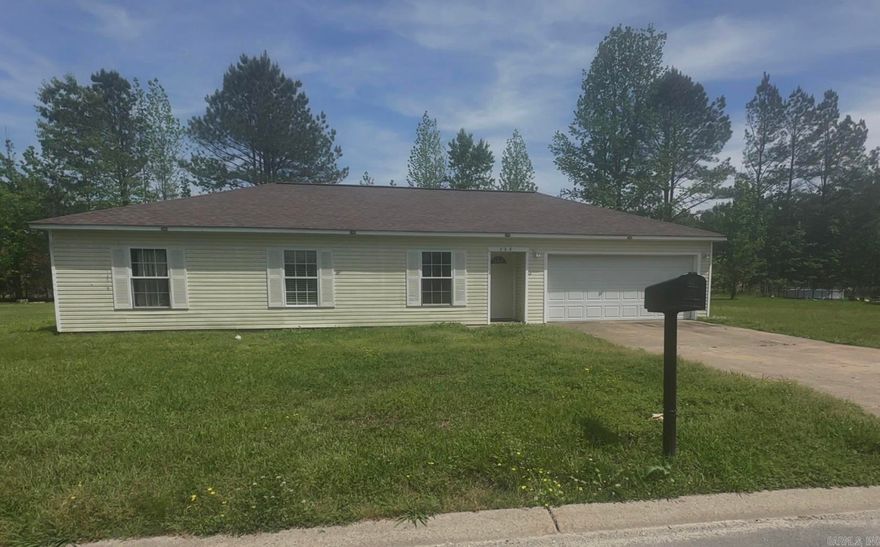 Welcome to 208 Glenn Oak Drive, a charming 4-bedroom, 2-bath home in Benton’s Harmony Grove School District. This property offers a garage and a large yard, providing space for vehicles, storage, and outdoor activities. Inside, the layout accommodates everyday living with four bedrooms and two full baths for convenience. Located in a desirable school district, this cute home balances comfortable indoor space with ample exterior grounds.