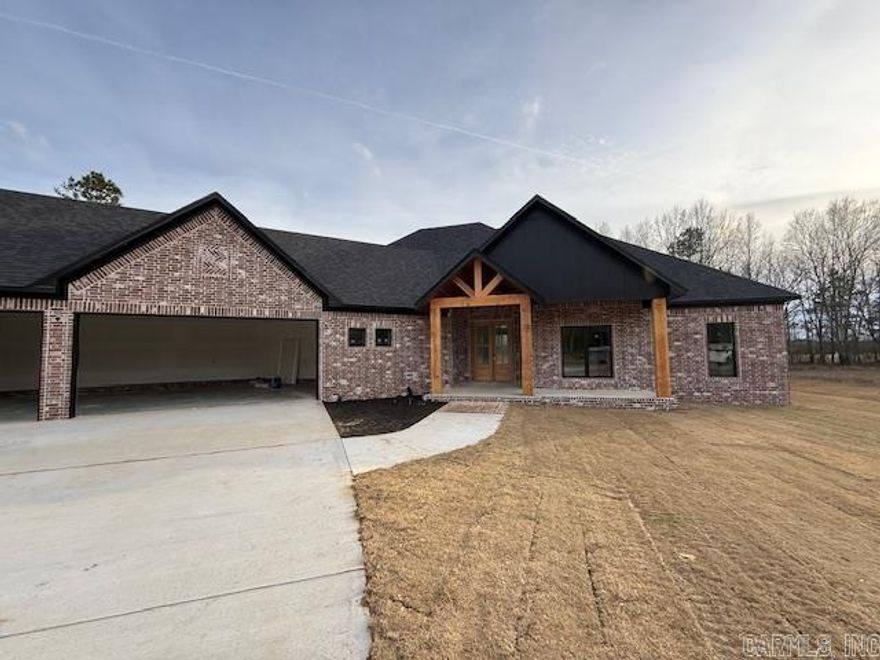 AMAZING HOME! This new construction home has it all! Living Room is vaulted. Even the back and front porches are vaulted with tongue and groove wood in the vault. The kitchen has loads of storage and a walk in pantry hidden by cabinetry. All of the cabinetry in this home is custom. Granite countertops throughout, custom shower, soaking tub. From the primary bathroom you can walk into the closet and into the laundry room. All bedroom closets in the home are walk in. Lockers for coats, shoes and backpacks as you come in from the oversized garage. Storage room in the garage. Three car garage! This home is fabulous!