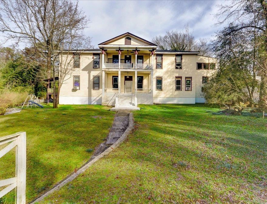 Charming Multi-Unit Rental Property in Scenic Hot Springs Welcome to 106 Breeze, a beautifully restored historic home offering flexible rental options in the heart of Hot Springs, Arkansas. This spacious property features three distinct rental units (3-bedroom, 2-bedroom, and 1-bedroom) nestled on lush, expansive grounds perfect for residents seeking peaceful, green living. Unit Features: Each unit is independently appointed with modern updated amenities including updated flooring, ceiling fans, and climate control. All units include stainless steel gas appliances and double-sink kitchens with ample cabinetry and open shelving. Living spaces showcase neutral gray walls with fresh white trim, and all units benefit from abundant natural light through multiple windows. Utilities & Services: All utilities are included in rent eliminating surprise bills and simplifying budgeting for tenants. Shared laundry facilities with phone-pay capability provide convenient, affordable laundry service for all residents.