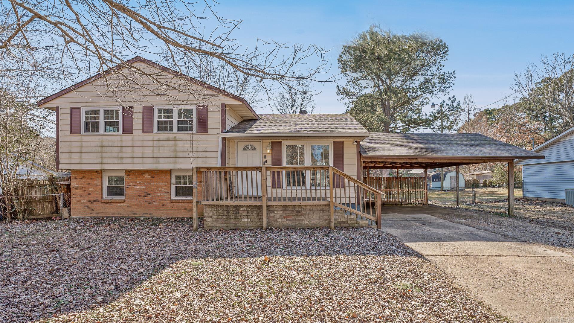 This versatile split-level home, is move-in ready and offers many options for new owners or a fantastic investment opportunity! The main level features a spacious living area and a functional kitchen, perfect for everyday living. Upstairs, you'll find three bedrooms and a full bathroom, providing comfortable accommodations. The lower level includes a private fourth bedroom, another full bathroom, and a bonus space that could be used as a home office, recreational area, or additional living space perfect for maximizing rental potential. The backyard is fully fenced, making it ideal for occupants with pets or those who value outdoor space. With its practical layout and strong appeal, this property is a solid choice for home owners or investors looking to add to their portfolio.