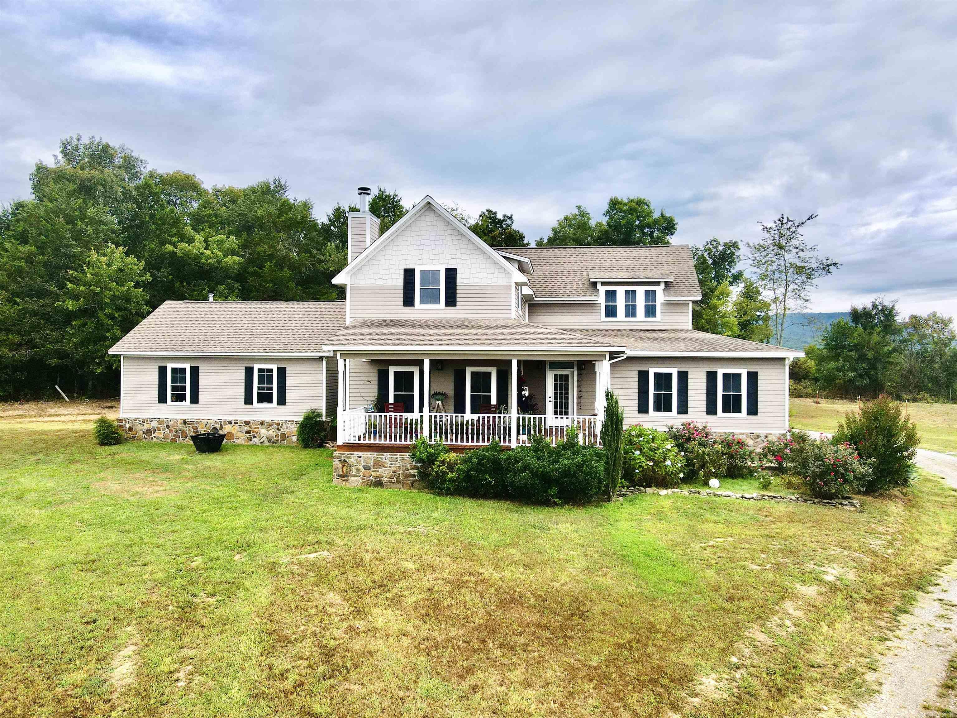 48 Acres m/l with 2640 sq ft custom built home & approximately 704 sq ft separate guest house. The main home has 3 bedrooms, 3 full bathrooms, one 1/2 bath, garden tub, heated floor in the master bath w/thermostat & timer, granite countertops throughout, walk in closets, sunroom, 2 car garage, fireplace, covered front porch, and beautiful Mountain Viewās. The property has year around springs, 2 ponds, barn, shed, pasture, woods, and wildlife.
