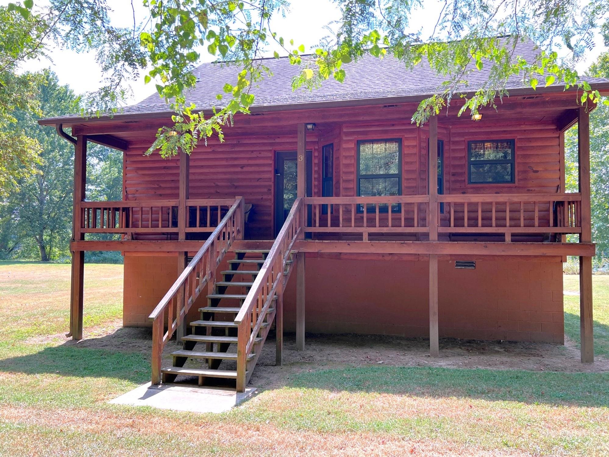 Nestled along the banks of the White River and tucked below the historic bluffs that give Calico Rock its name, this 1,422 sq. ft. riverfront cabin is a rare find. Gated access and a hidden road lead to unmatched privacy, where rustic charm and modern comforts combine. The home offers 1 bedroom, 2 full baths, and a spacious loft that could easily be converted into a second bedroom. Warm wood accents, an open floor plan, and wide windows frame breathtaking river views. Outside, the covered porch is the perfect place to sip your morning coffee while watching the White River flowāfamous for world-class trout fishing and natural beauty. Set on a level, half-acre lot with direct river frontage, this turnkey property is move-in ready. With central heat and air, a fully equipped kitchen, washer/dryer, and ample parking, itās ideal as a private retreat, full-time residence, or vacation property with excellent investment potential. Experience riverfront serenity below the bluffs of Calico Rockāshown by appointment only.