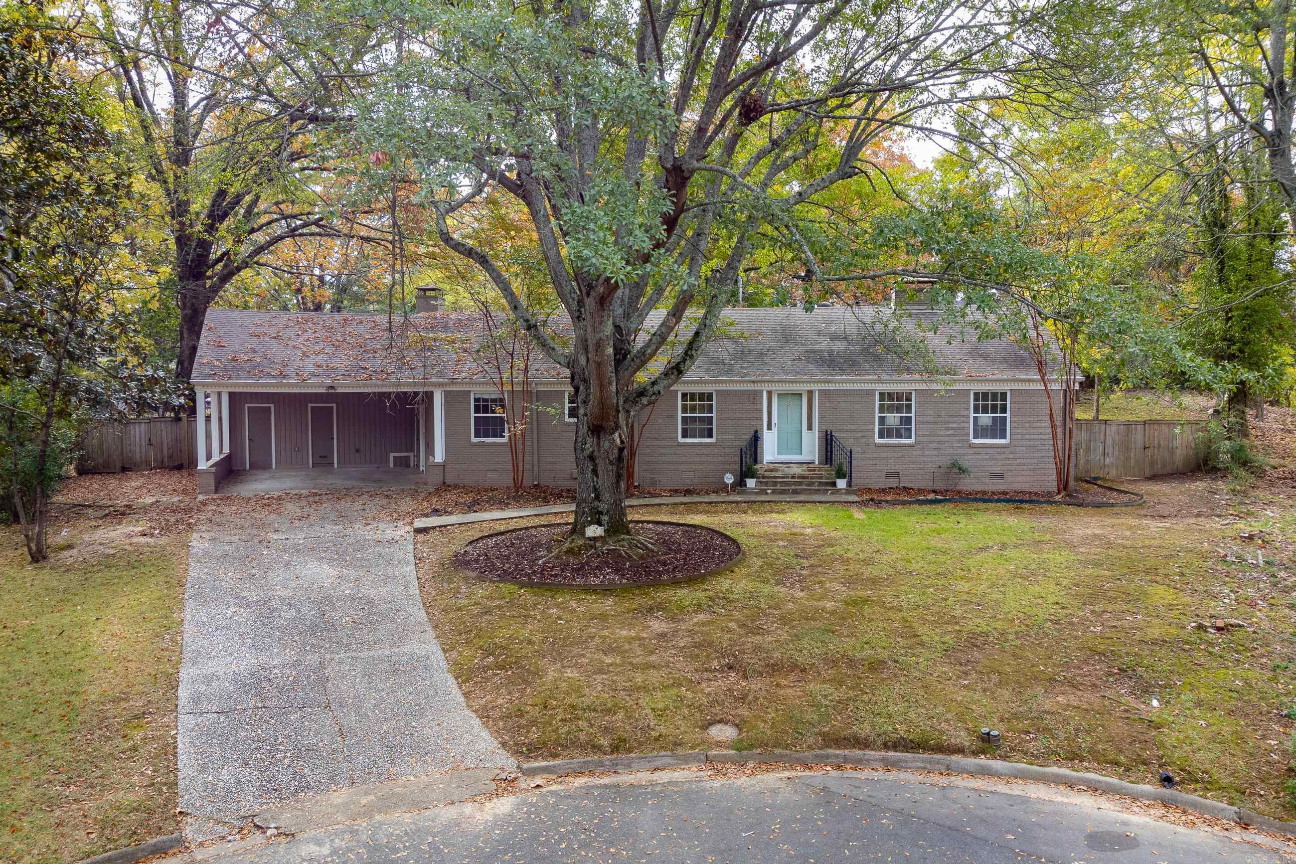 Many updates in this traditional family home in beautiful Kingwood Place located off of cul-de-sac. New paint and hardwoods. Large formal living area with WBFP and gas logs as well as formal dining off the entry foyer. Eat in Kitchen with updated cabinet system including pull out drawers, pantry and storage. Fabulous hardwood floors flow into den/family room with stone WBFP with gas starter. Split floorplan has two bedrooms, one w/en-suite bath (new updates), the other shares hall bath off one side of the den, third bedroom is en-suite and off the other side. Huge 410 SF (not incl in SF) bonus/work/pool room great for entertaining. Fantastic fully fenced backyard with in-ground pool (new liner) and shed for equipment. New HVAC unit (2024). Two car carport with large storage area. Come See!