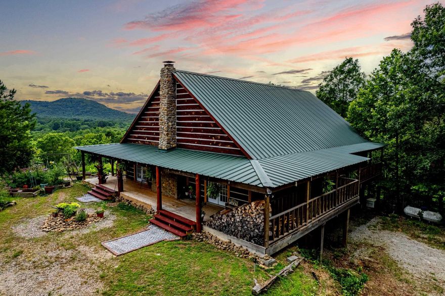 Welcome to 126 Crows Nest Place, a stunning property nestled a top an amazing mountain overview.  The property has ample space surrounding your home as you set in the middle of over 6 acres of privacy. Enjoy your morning coffee as you wake up over looking the arear mountains as deer eat in your back yard.  The wildlife is abundant around every corner of this property.     The home has so much charm and personal craftmanship inside and out.  The sellers personally cut and finished the log beam, cedar counter tops and much more.  Ever rock of the custom fireplace was laid with a labor of love for this home. Other extras include Tankless HW, Generac Home Generator, and a year round spring on the property.  While the property is very private you are still just a couple of minutes from the new by pass to Hot Springs or 5 minutes to Hot Springs Village and Fountain Lake.    Don't miss the opportunity to make this sanctuary your own.