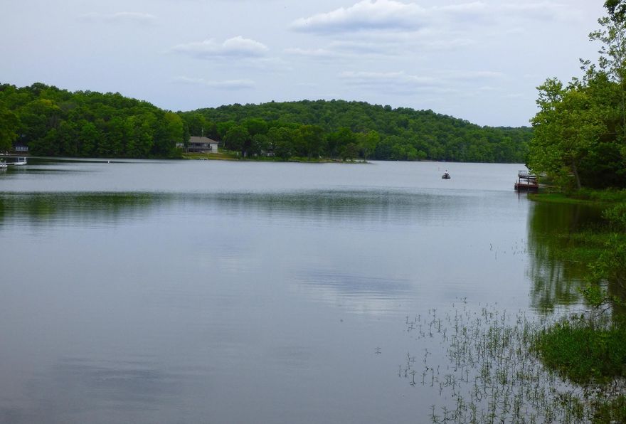 130 Feet of Lakefront Bliss on Beautiful Lake Omaha  Imagine waking up to glassy waters and peaceful mornings—this 130-foot lakefront lot on Lake Omaha offers the perfect canvas for your dream getaway or forever home. Tucked in a quiet, picturesque cove surrounded by new construction, the setting is serene yet full of promise.  Already partially cleared and ready to build, this property invites you to enjoy boating, fishing, water skiing, swimming, or simply soaking in breathtaking year-round views.  Tranquility meets opportunity—seize your slice of lakeside living.  Cherokee Village, Arkansas offers a peaceful, nature-rich getaway with seven beautiful lakes perfect for fishing, boating, and swimming. The community features two scenic golf courses, miles of wooded hiking trails, and striking bluffs that add dramatic views throughout the area. The South Fork River winds through town, offering great spots for kayaking or relaxing by the water. With abundant outdoor recreation and a welcoming small-town atmosphere, it’s an ideal destination for both adventure and tranquility.