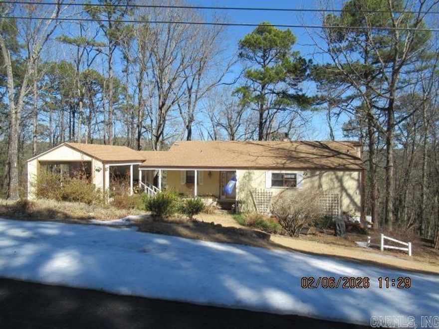 This home is on 2 lots and is great for a weekend getaway or full time living. The main level has a great room, kitchen, dining area and wood-burning stove. 2 beds, 2.5 baths, all appliances are updated and included. The deck is FULL LENGTH.  Call today to see your next home!