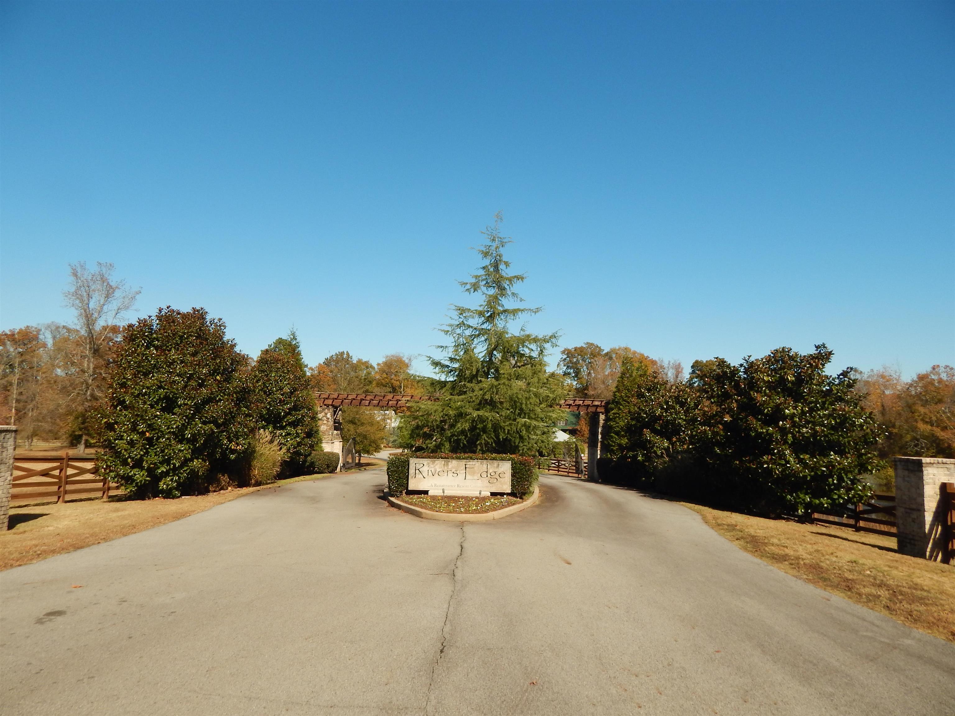 Rivers Edge is a Zero Maintenance Subdivision on the Little Red River! Beautiful Lot located just across the street from river & subdivision access, and a few steps from the community pool. Gated entry, private sewer system, city water, Community Dock & Mountain Views are just a few of the amenities that this subdivision offers. All ground maintenance, private roads & pool access is included. What a great place to have a home.
