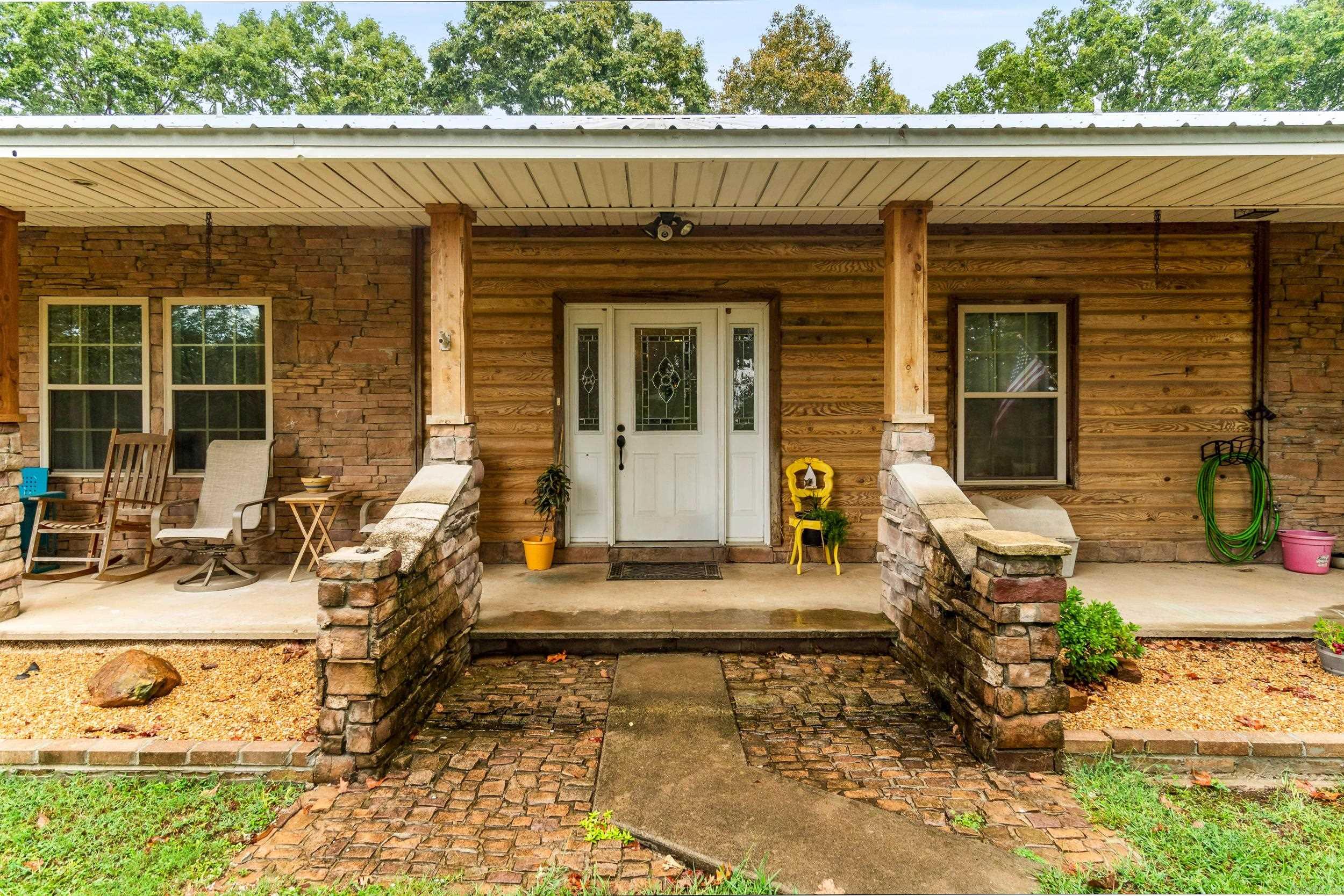 This Amazing Home in Romance has so many amenities , The View off the front porch is Fabulous. Property features a big Shop that is 30X40 with insulation and Electricity with a 20X36 Lean to with roll up doors and 16 ft Sidewalls. Home has a one-of-a-kind sunroom with a fireplace. Fishing Enthusiast will love the location that is walking distance to Lake Barnett. Breathtaking Tongue n Groove in one of the family rooms and a wood stove also. Beautiful Wood Floors throughout home and Tile Floors in Kitchen and all 3 bathrooms. Tile Beautiful Backsplash in the kitchen! Hot water heater on one side of home and an On Demand Hot Water Heater on Master Bedroom side of home. Master En Suite features a walk-in shower and Large Jetted Tub. Home features a Home Office and another room that can be used as a Craft room or Exercise room. Concrete Driveway from road to Carport. Metal Roof. Give Me A Call Today! See agent remarks