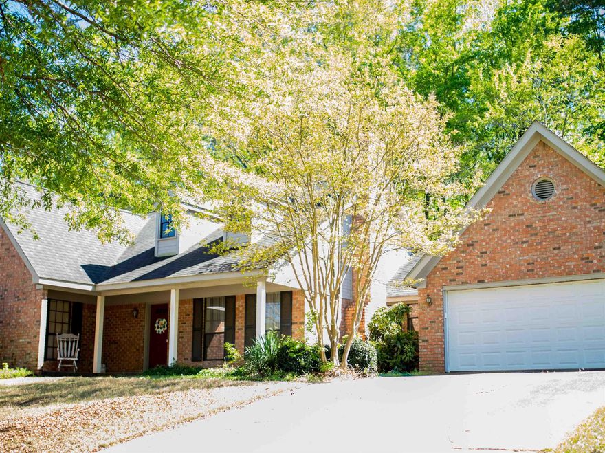 This charming one owner brick home is ideally located in a desirable neighborhood and close to shopping and schools. Inside, you'll find tall ceilings and a bright sunroom looking out into a wooded view. The home features a spacious dining room, a galley-style kitchen with a cozy kitchen nook, a very spacious laundry room and two car garage containing extra storage space.  All the bedrooms are generously sized with large closets. Updates include all new master bath with walk-in shower, new toilets, new tile in hall bathroom, wood flooring throughout, new LG refrigerator with French doors, new range and a new insulated garage door.  This home is move-in ready and waiting for its next owners.  Schedule your showing today!