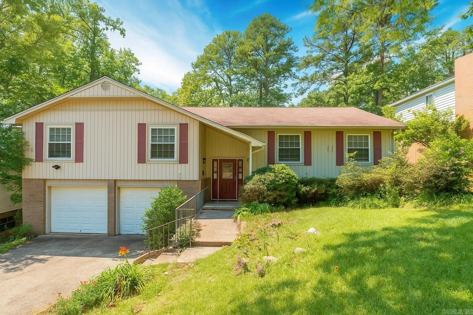 West Little Rock split-level home located in Echo Valley, close to Pleasant Valley and River Ridge. This home offers plenty of space including 3 living spaces, 4 ample sized bedrooms, 2.5 completely updated bathrooms, an eat-in kitchen with double ovens and a 2-level deck that overlooks a park-style backyard. New hardwood & paint in master bedroom. New hardwood floors in living room & hallway, new paint in entry & new stairs This home is centrally located to all of your shopping & entertainment needs & within walking distance of the beautiful neighborhood park, pool and nature trail. See agent remarks