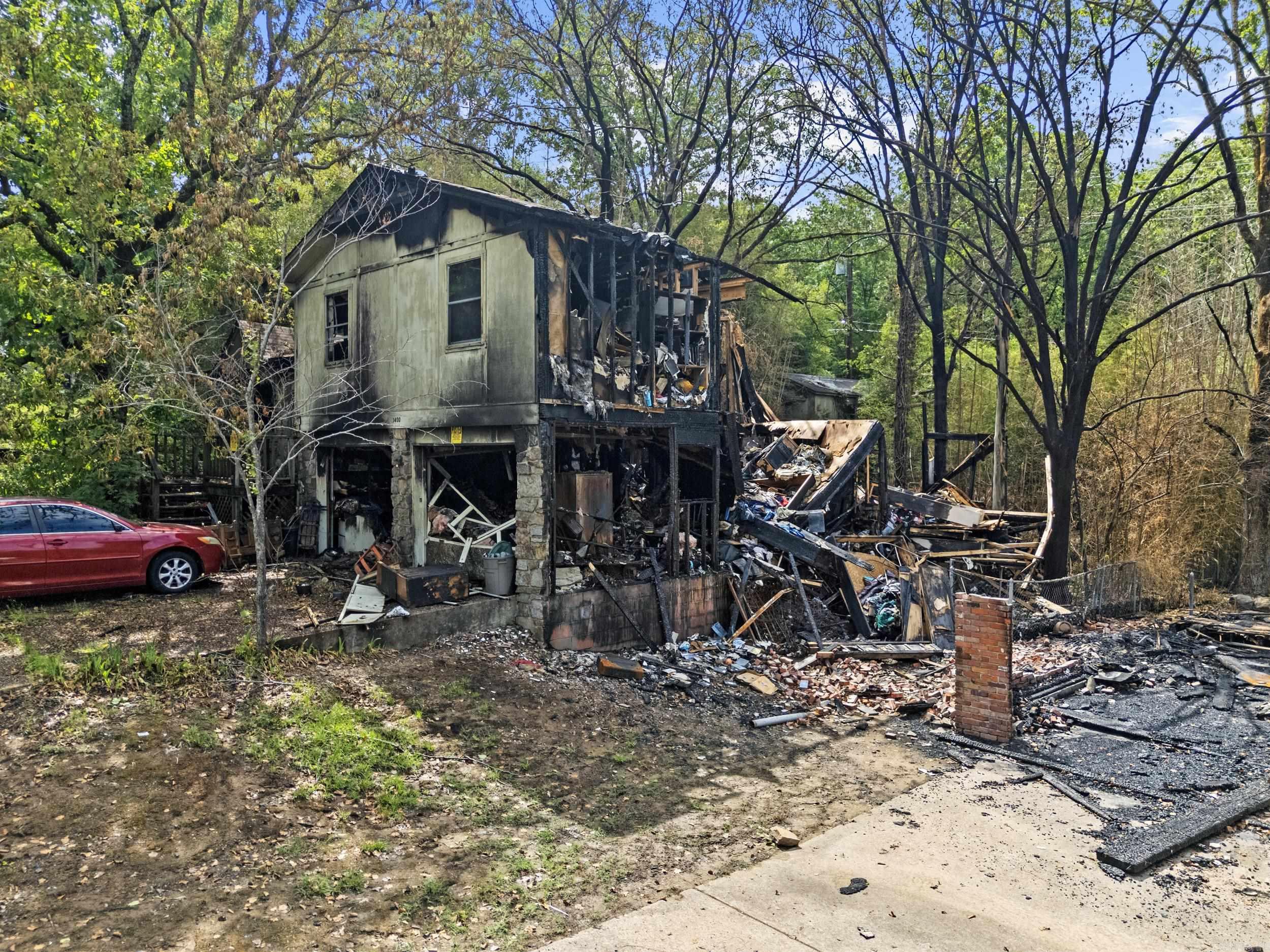 DO NOT ENTER THE BURNED HOUSE!! It is extremely dangerous!! This was a 1980 tri-level with 2148 s/f. The lot backs up to greenspace and is in a nice friendly subdivision. Sellers are selling AS IS, no demolition or removal of debris. Take advantage of this unique opportunity! Make an offer today and take the next step in building your new home or adding to your investment portfolio! SEE AGENT REMARKS!