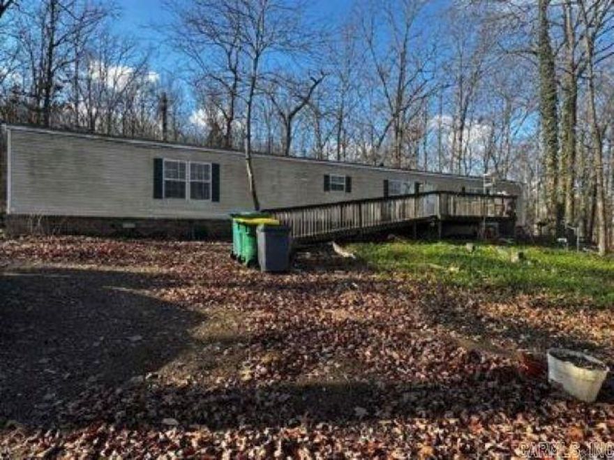 Welcome to your slice of country living! Nestled on 4.48 beautiful acres in Cabot, this property offers the perfect blend of space, privacy, and potential. The 1,312 sq. ft. manufactured double wide home, built in 1993, provides comfortable living with room to make it your own. Surrounded by open land, you will enjoy endless opportunities for gardening, recreation, livestock, or simply soaking up the peace and quiet.  Build your dream home while living on-site, this acreage gives you the flexibility you need. Located just minutes from Cabot schools, shopping, and dining, you get the best of both worlds—quiet country charm with convenient access to town.  Seller will provide 5k for repairs. Go take a look today!  Don’t miss the chance to own this rare acreage property in one of Cabot’s most desirable areas!