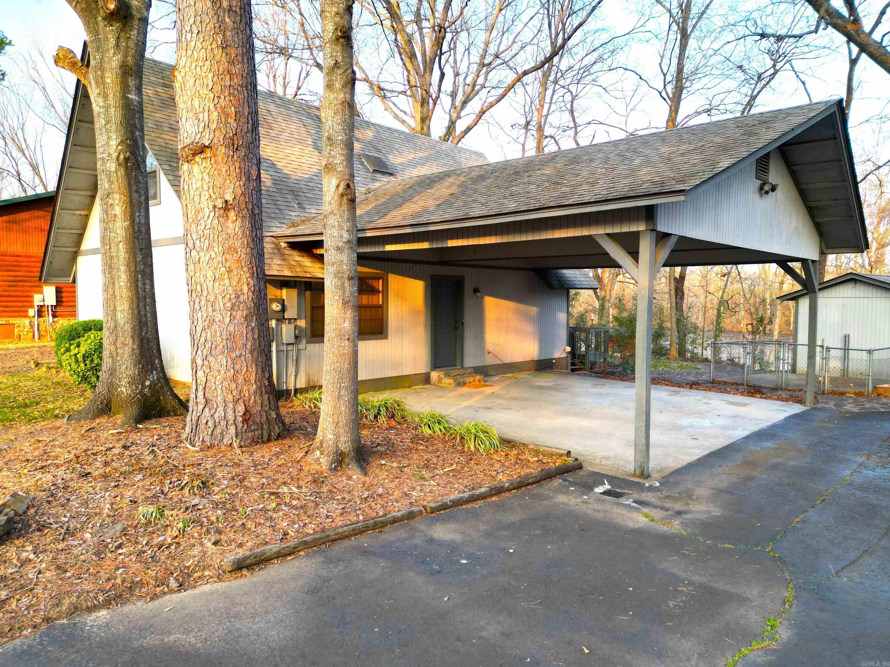 Always wanted a fishing cabin? This is it! Comfortable and move-in ready. A short boat ride or paddle to world-famous Cow Shoals. On deep water with undeveloped land across the river. Not in subdivision, short term rental okay. Big back yard, big river view. Outside storage building, covered boat storage, covered parking. Newer septic and HVAC. Approximately 10 minutes from shopping and services in Heber Springs and marina/public access to spectacular Greers Ferry Lake. Appliances convey. Wood burning stove for cozy evenings after a day on some of the best trout waters in the lower 48!
