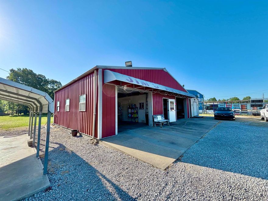 1.57-acre +/- property on Highway 62/412 in north-central Arkansas-- a standout opportunity for a wide range of thriving business ventures!!! With excellent visibility, steady traffic, and easy access, it’s perfectly positioned for retail, service, automotive, or contractor-based operations to succeed. With over 40 years as a successful used car lot, this location has a proven history of strong performance and high exposure! The property features a 30x40 commercial building with office space, bathroom, and garage, along with a 14x28 Bald Eagle Barn—ideal for storage, workspace, or future expansion. The level, open acreage offers plenty of room for parking, additional buildings, or scaling your business as it grows. Utilities are available and nearby, making future expansion or even building a new home convenient and cost-effective! Whether you’re starting fresh or expanding, this property delivers flexibility, visibility, and long-term potential in the booming Ozarks region! (**Lot lines in listing photos are approximate.**)