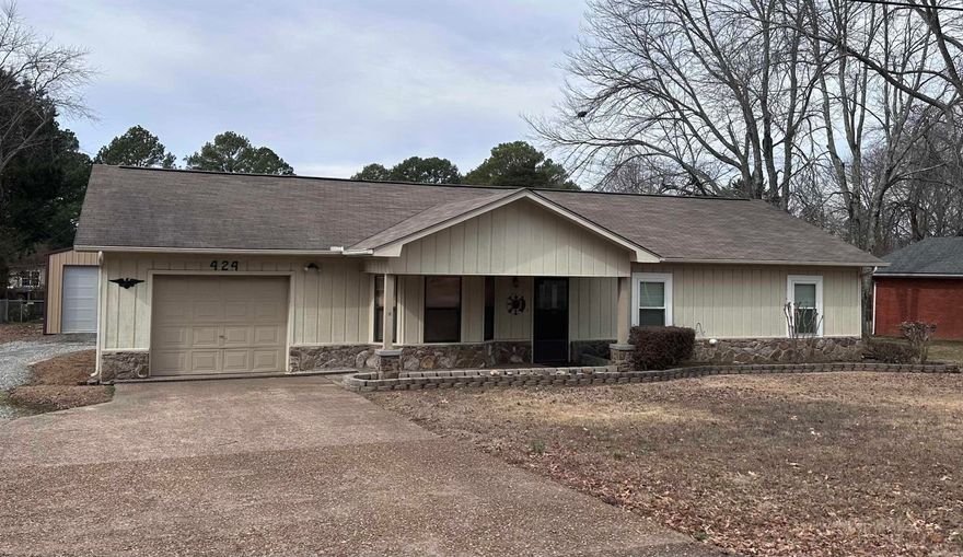 Welcome to your dream home! This charming 3-bedroom, 2-bathroom house is perfectly situated in a prime location, close to everything you need for convenient living.  Step inside to discover a spacious living & kitchen area that is perfect for interacting with family and or guests.  Outside, you'll find a beautiful yard in the middle of a quiet neighborhood and a storm shelter. But the real highlight is the brand new 30x30 insulated shop, providing ample space for storage, hobbies, or even a home workshop.  Located just moments away from schools, Greers Ferry Lake, and shopping, this home offers the perfect blend of convenience and comfort. Don't miss your chance to make it yours!