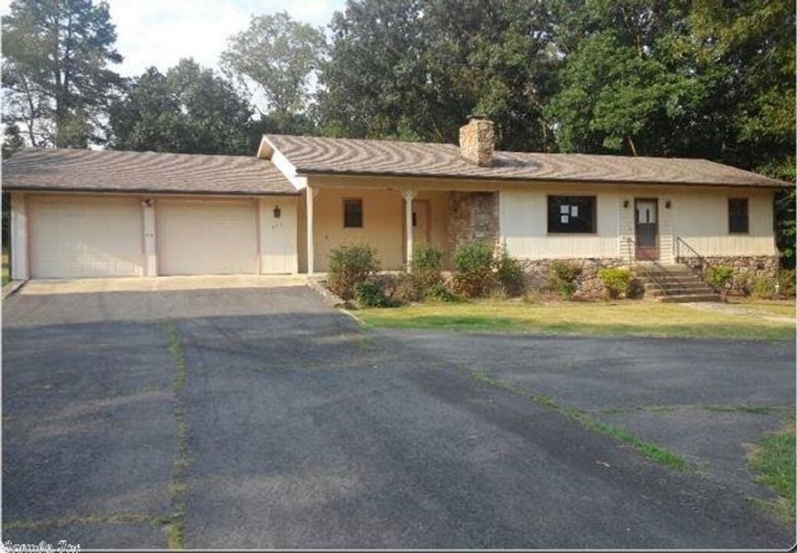 Great open living area with rock fireplace.  Two car garage. Quiet neighborhood.  HUD Owned property For Sale.  For information on bidding, Earnest Money procedures and more, visit:  www.HUDHomestore.com.  Please refer to HUDHomeStore.com for the most recent bidding period details and information on this property.  Property is Sold “AS IS”.  All Offers are to be submitted electronically at:  www.HUDHomeStore.com.  (SEE AGENT CONFIDENTIAL REMARKS FOR FURTHER INSTRUCTIONS)