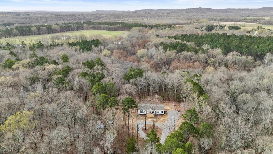 Beautiful secluded property located just minutes from Pangburn city limits and Little Red River and close proximity to Searcy and Heber Springs. This property is nestled in a private wooded area with 15.6 acres m/l. The Home is less than a year old (2024) features 1680 sq ft., 3 bedrooms, 2 baths. Open floor plan, living area features neutral colors, modern finishes, stainless appliances and luxury vinyl plank flooring. This property is a rare find and offers the perfect opportunity to live in peace, surrounded by nature, while still being close to all the conveniences of Pangburn and Little Red River. Don’t miss out – schedule a tour today!