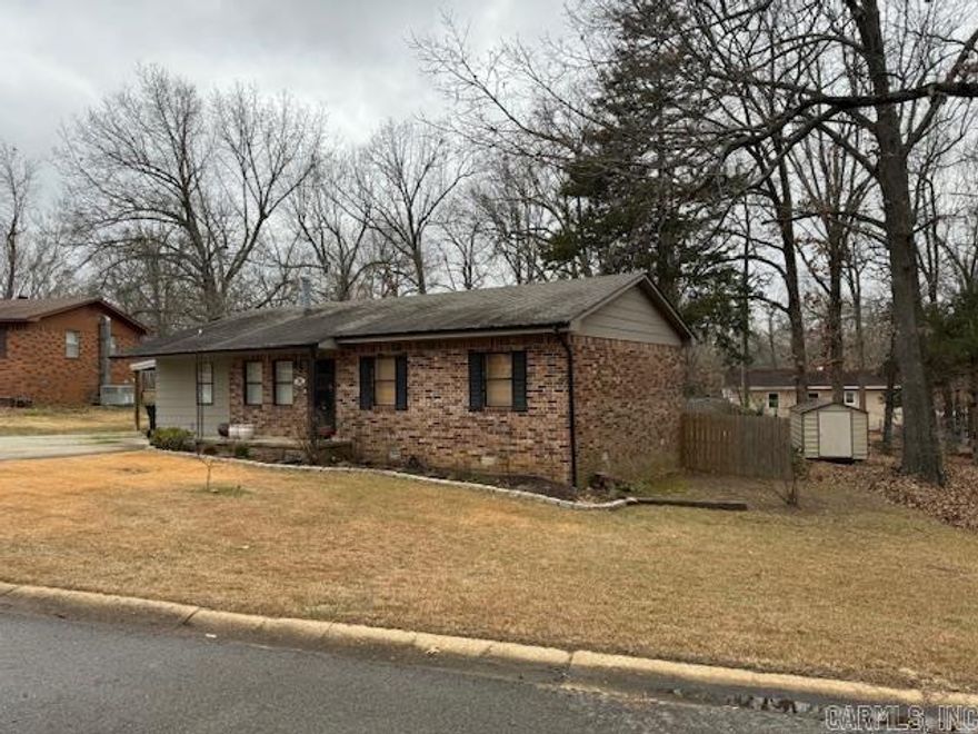 UPDATED 3/1.5 HOME IN TOWN! Nice home has 3 bedrooms and 1 and 1/2 bathrooms. Large living room with built ins. Gorgeous kitchen and dining combo with a bar, stove, microwave and dishwasher. Large storage room. Carpet and laminate flooring. Newer central heat and air. Washer and dryer stay! Privacy fenced back yard. Nice deck. Storage building. Remodeled in 2020. Home is all electric. 1350 square foot. Located on large lot in a cul de sac!