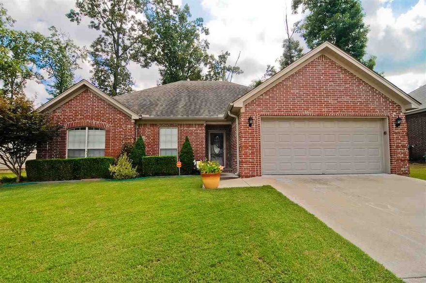 ABSOLUTELY STUNNING!! HERE'S YOUR CHANCE TO LIVE IN THE WONDERFUL WOODRUFF CREEK NEIGHBORHOOD. YOUR HOME'S FEATURES INCLUDE: BRAZILIAN CHERRY WOOD FLOORS- EXT. CROWN MOLDING- TRAY CEILING IN GREAT ROOM- SPACIOUS KIT. W/ TONS OF COUNTER SPACE- 4 BEDROOMS- SPA LIKE MASTER SUITE & BATH- AND FINALLY  EXT. LANDSCAPING W/ A PARK LIKE SETTING IN THE BACKYARD. SO CLOSE TO THE POOL, SCHOOLS, AND SHOPPING!! MAKE THIS YOUR FINAL STOP!!