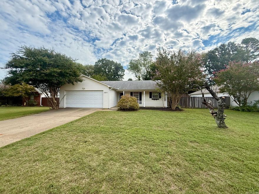 Situated in the sought-after community of Bryant, this residence offers desirable features. Highlights include a relaxing screened porch and a secure, fenced backyard. The interior has been tastefully updated with fresh paint and flooring, creating a bright and welcoming atmosphere. A storage building is also included.