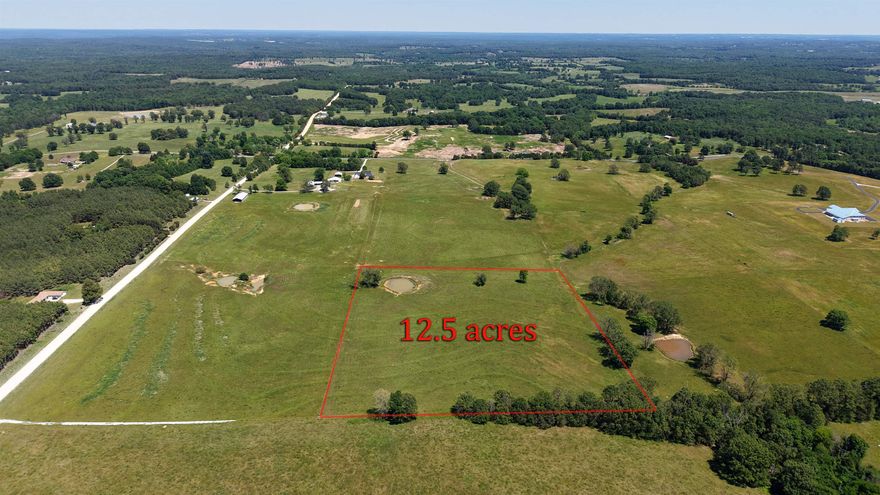 Discover this prime 12.50-acre tract in a highly sought-after rural setting, with the convenience of town just minutes away.  Ideally located near schools, a golf course, shopping, and daily amenities, this property is perfect for building your custom home, creating a hobby farm, or establishing your own small homestead in the beautiful Ozarks of North Central Arkansas. With electricity and water available, development is simple and efficient. The land is fully fenced and features a scenic pond, providing excellent potential for pastureland, livestock, or small-scale farming. An easement road is currently being constructed for easy access. Properties like this are a rare find—versatile acreage priced at just $109,900, with additional land available if desired.
