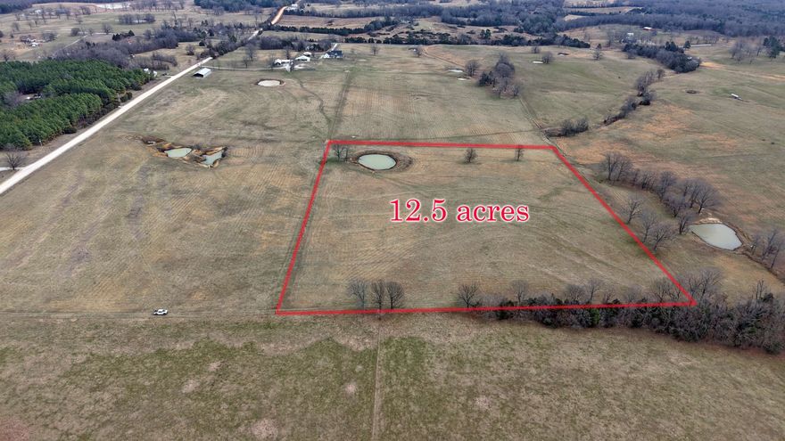 Discover this prime 12.50-acre tract in a highly sought-after rural setting, with the convenience of town just minutes away.  Ideally located near schools, a golf course, shopping, and daily amenities, this property is perfect for building your custom home, creating a hobby farm, or establishing your own small homestead in the beautiful Ozarks of North Central Arkansas. With electricity and water available, development is simple and efficient. The land is fully fenced and features a scenic pond, providing excellent potential for pastureland, livestock, or small-scale farming. An easement road is currently being constructed for easy access. Properties like this are a rare find—versatile acreage priced at just $109,900, with additional land available if desired.