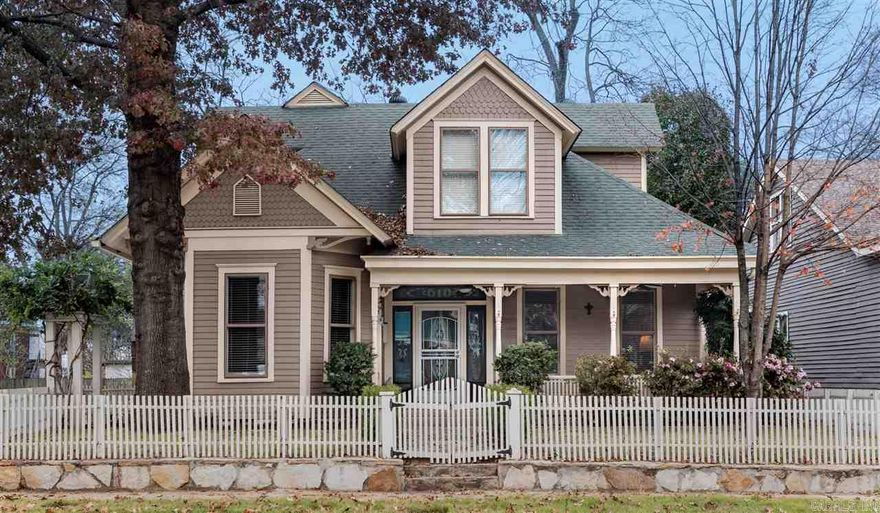 Stunning 1885 remodeled Victorian cottage! Rare find 3 car garage + tons of off-street parking! Gorgeous original hardwoods, 10' & 12' ceilings, stained glass front door. Cherry cabinets in kitchen w/ Carrara Marble countertops! Marble flooring in kitchen as well as master bath! Master suite has 2 closets, marble walk in shower. Upstairs has 2 oversized bedrooms w/ spacious bath & double sinks! Delightful front porch & oversized covered back deck w/ separate covered BBQ area. Fully fenced front & backyard!