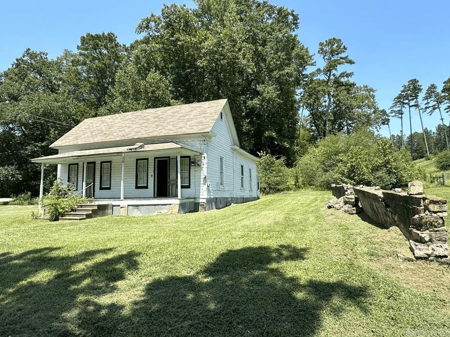 Own a piece of history! This 3BR 1 Bath home was built in 1900. The kitchen still has the original cast iron sink. City water and sewer. 13x30 concrete block walled workshop/garage. Priced to sell! Located in Caddo Gap Arkansas. Minutes from the Caddo River and in the Caddo Hills School District.