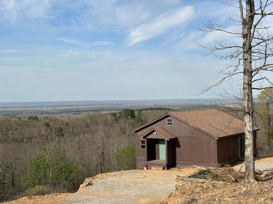 Welcome to your own slice of peaceful country living! This 2-bedroom, 1.5-bath, approximately 946 sq foot home sits on 4 acres, offering stunning views you can enjoy right from the porch—perfect for morning coffee or evening sunsets. The home has been remodeled and partially finished out, providing a great foundation with plenty of opportunity to make it your own. Whether you're searching for a quiet place to call home or a promising investment property, you will want to come see this one!
